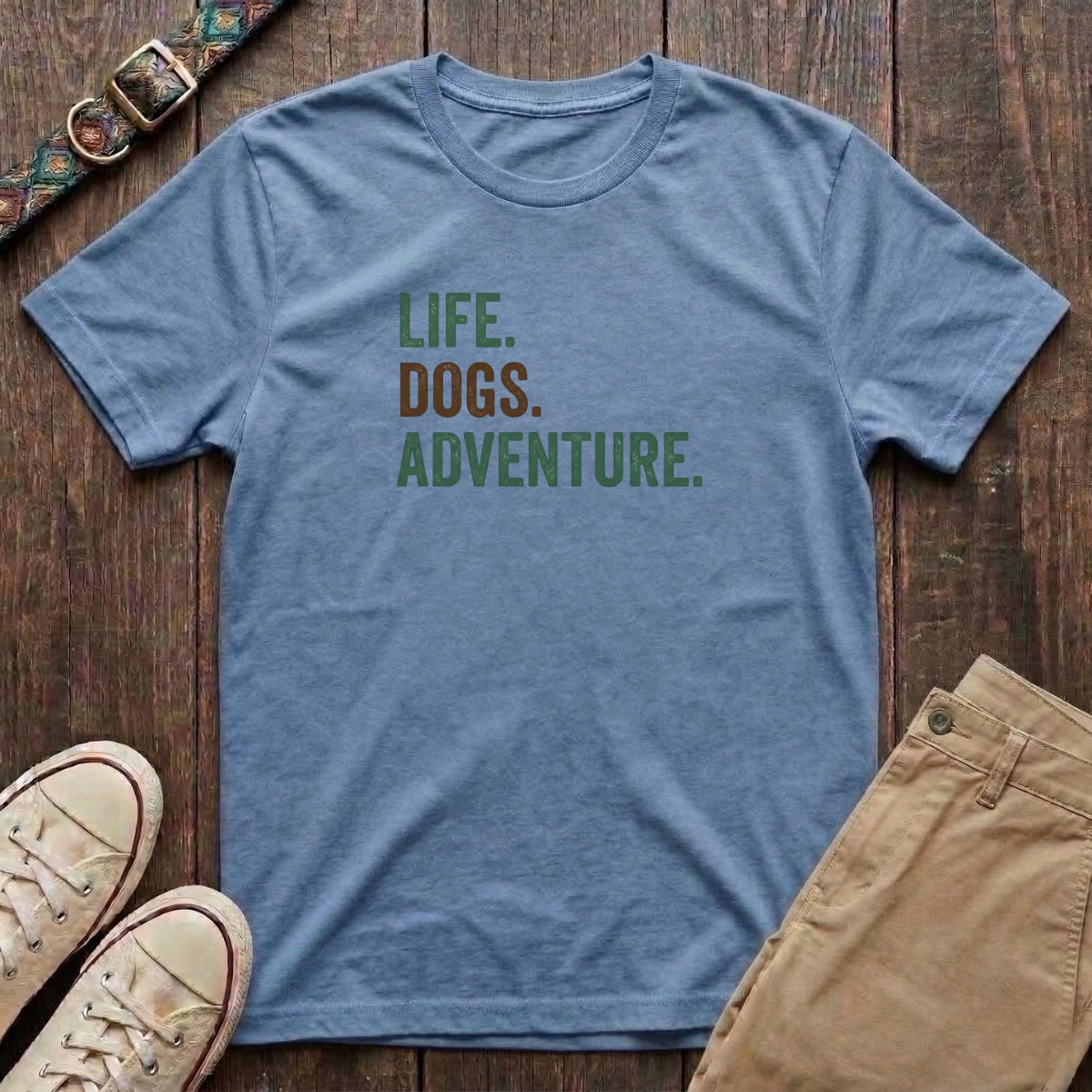 Light blue dog adventure t-shirt with Life Dogs Adventure slogan in distressed green and brown type by Fetchkind