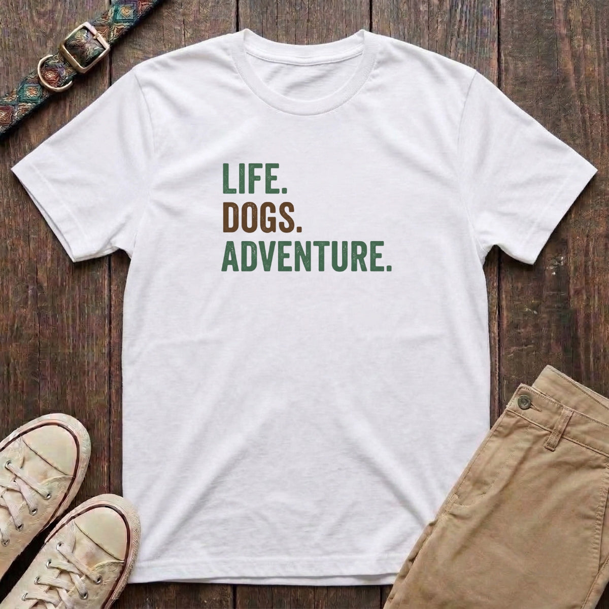 White dog adventure t-shirt with Life Dogs Adventure slogan in distressed green and brown type by Fetchkind