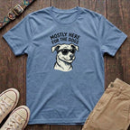 Light blue funny dog lover t-shirt with Mostly Here for the Dogs slogan and cool dog in sunglasses illustration by Fetchkind