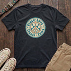 Black retro dog lover t-shirt with Peace Love Treats Paws distressed paw peace sign badge design by Fetchkind