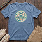 Light blue retro dog lover t-shirt with Peace Love Treats Paws distressed paw peace sign badge design by Fetchkind