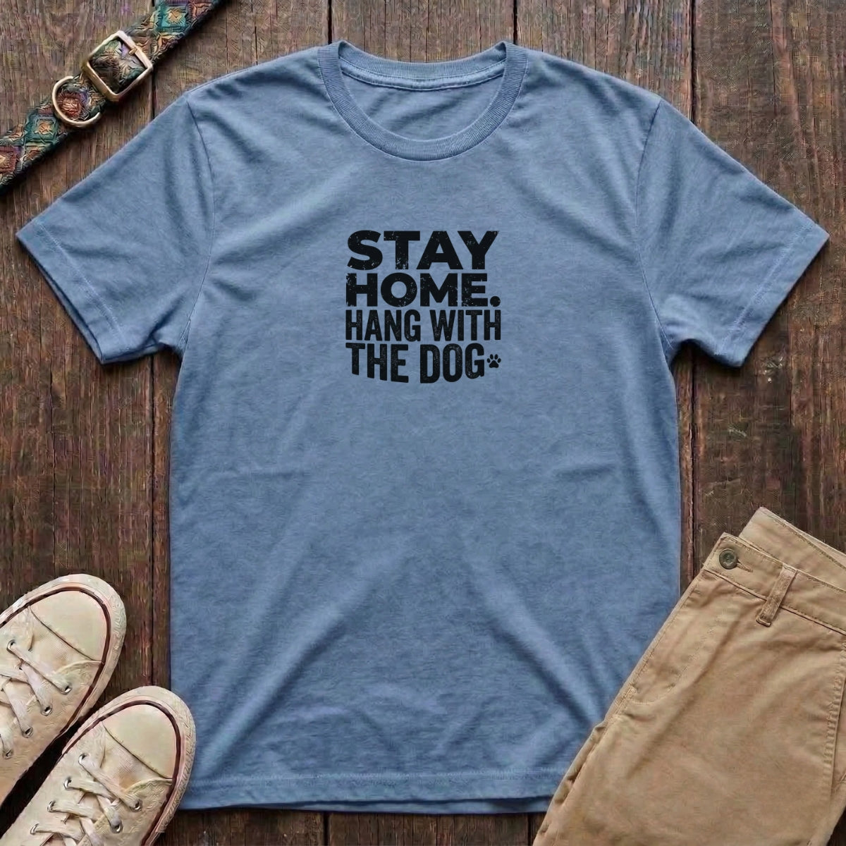 Light blue dog lover t-shirt with Stay Home Hang With the Dog bold distressed block type and paw print by Fetchkind